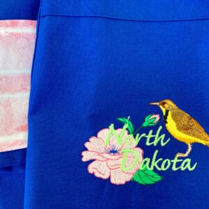 Product image of North Dakota State Flower and Bird Apron