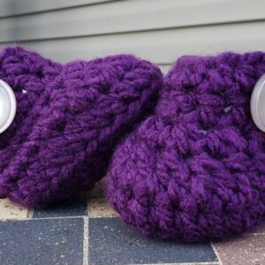 Product image of Purple baby booties with shiny pearl buttons 3-6 months