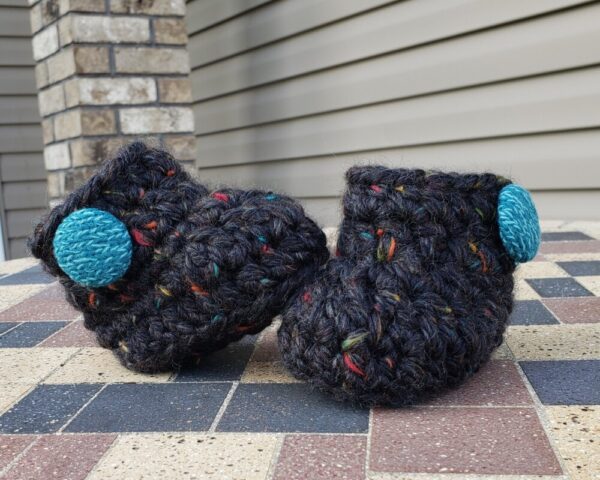 Product image of Black/dark grey baby booties with teal buttons 6-9 months