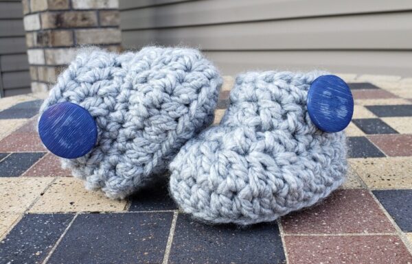 Product image of Light grey baby booties with blue button 3-6 months old