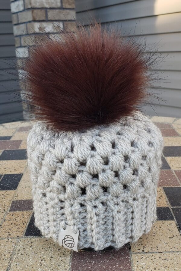 Shop North Dakota Light cream hat with brown/reddish poof ball 0-3 months size