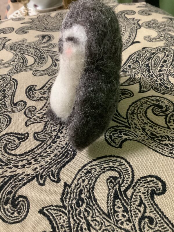 Product image of A handcrafted felted wool penguin figure decor