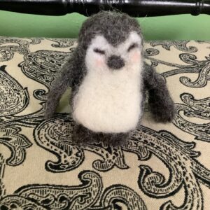 Product image of A handcrafted felted wool penguin figure decor