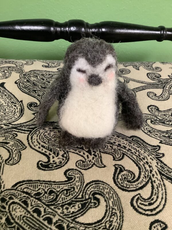 Product image of A handcrafted felted wool penguin figure decor