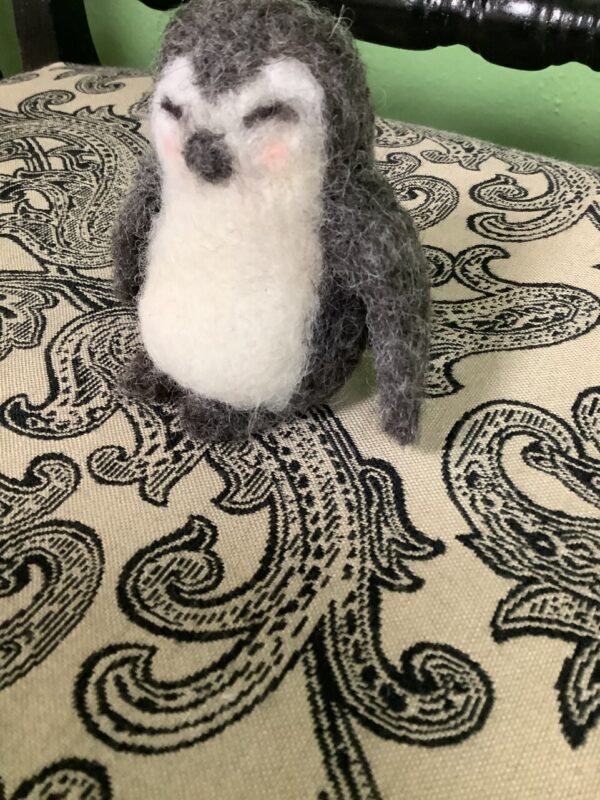 Product image of A handcrafted felted wool penguin figure decor