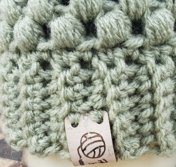Shop North Dakota Sage green baby hat with multi colored poof ball; 0-3 month size