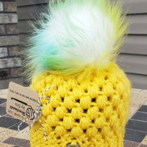 Shop North Dakota Sunny yellow hat with multi colored poof ball; 3-6 month size
