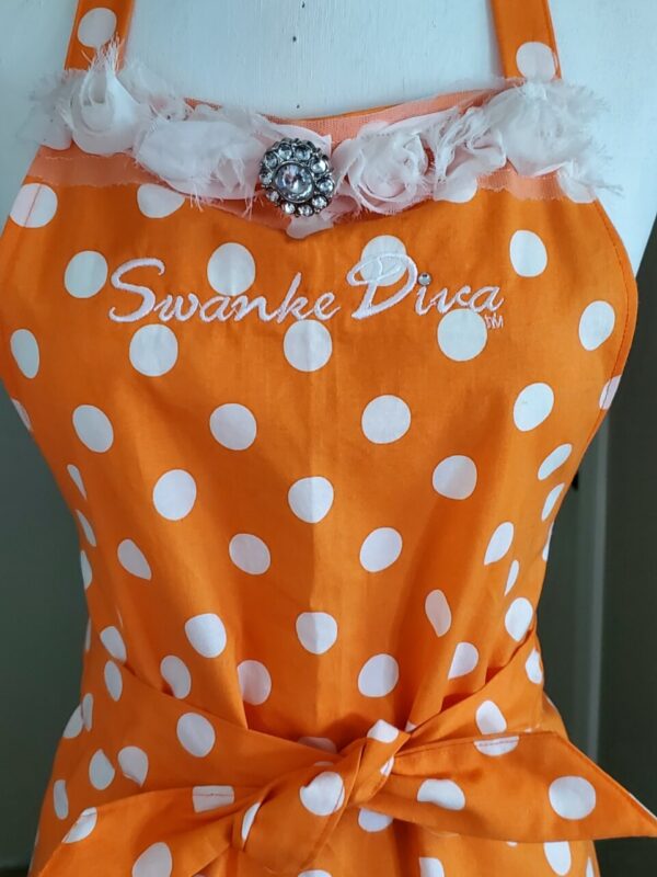 Product image of Swanke Diva® Apron | Orange + White Polka Dots