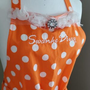 Shop North Dakota Swanke Diva® Apron | Orange + White Polka Dots