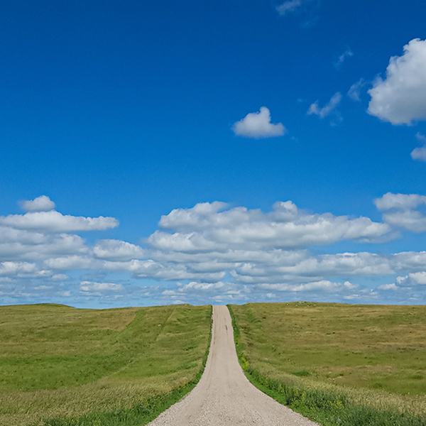 Product image of Gravel road to blue skies in North Dakota, Magnet