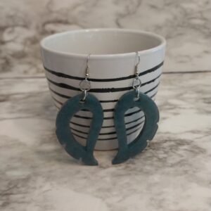 Shop North Dakota Dark charcoal glittery wing earrings