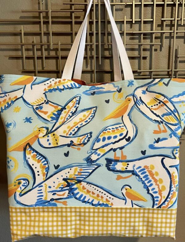 Product image of ” Perky Pelicans” Oversized Tote