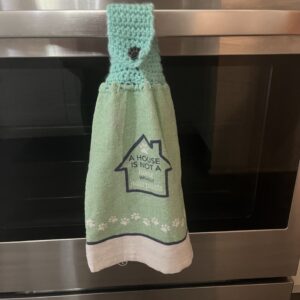Product image of Crocheted Towel, Double Crocheted Towel, Double Sided Crocheted Towel. A House Is Not A Home Without Paw Prints Crochet Towel, Minty Crochet Towel, Paw Print Button