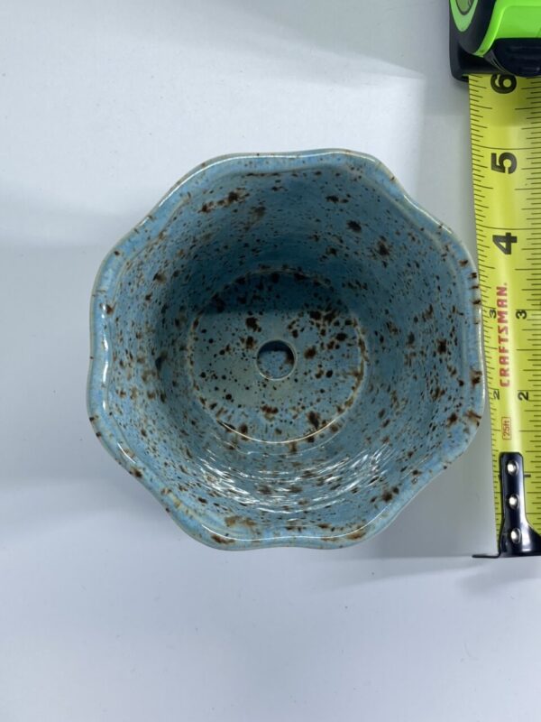 Product image of Wavy stoneware planter with saucer