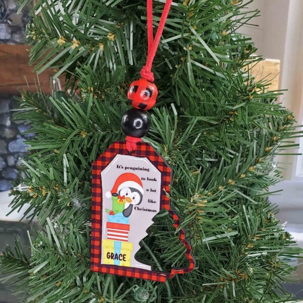 Product image of “Penguining to Look a Lot Like Christmas” Personalized Ornament