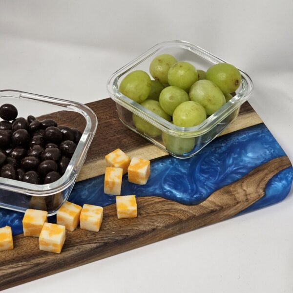 Product image of Long Narrow Walnut and Blue Resin Charcuterie Board with handle