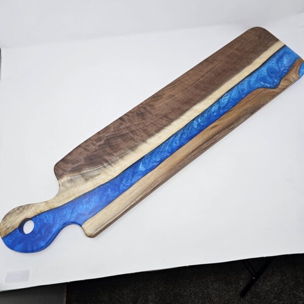 Product image of Long Narrow Walnut and Blue Resin Charcuterie Board with handle