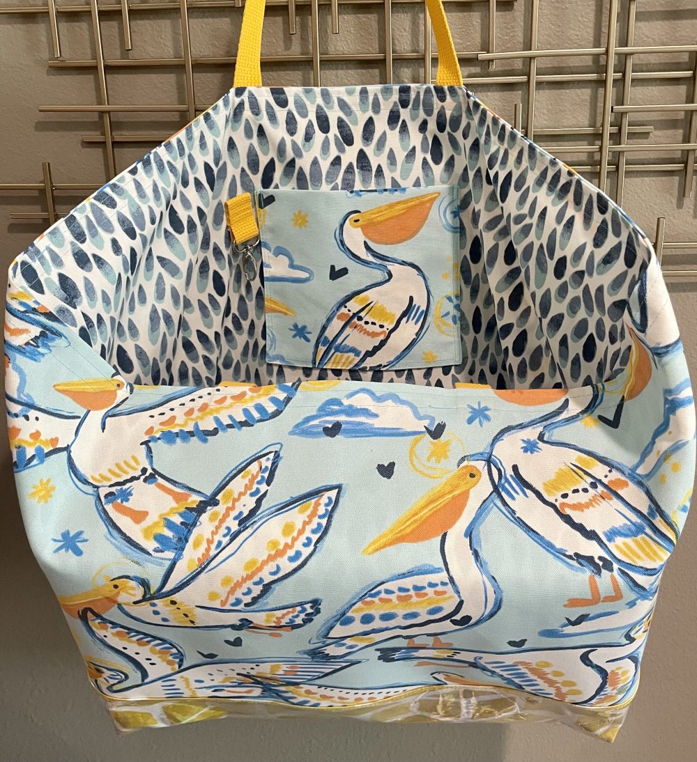 Product image of ” Perky Pelicans” Oversized Tote