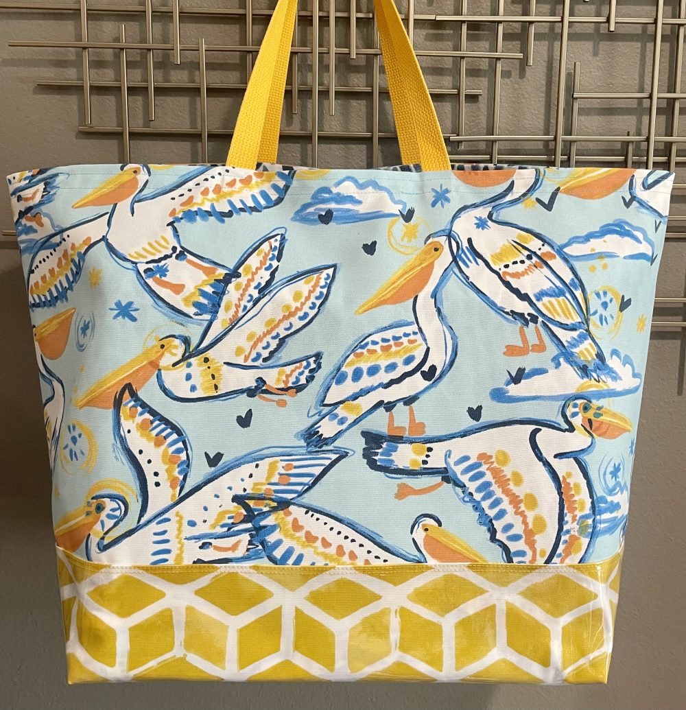 Product image of ” Perky Pelicans” Oversized Tote